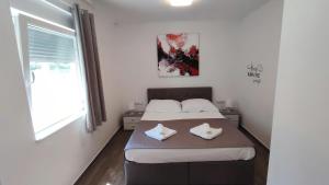 A bed or beds in a room at Holiday Home Aurora