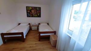 A bed or beds in a room at Holiday Home Aurora