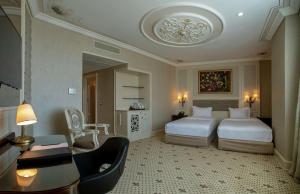 DoubleTree By Hilton Gaziantep客房内的一张或多张床位