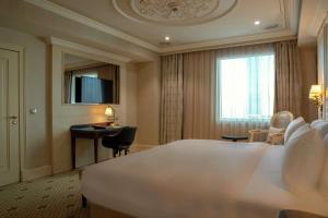 DoubleTree By Hilton Gaziantep客房内的一张或多张床位