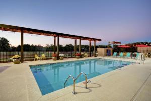 a swimming pool at a resort with at Home2 Suites By Hilton Lagrange in La Grange