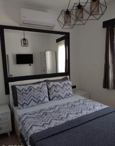Llit o llits en una habitació de Kardelen Otel