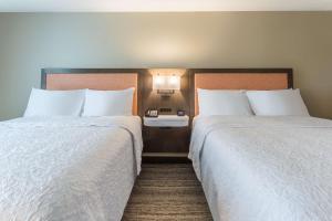 Hampton Inn And Suites Guymon客房内的一张或多张床位