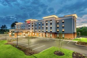 a rendering of a hotel with a parking lot at Hampton Inn & Suites Kittery in Kittery