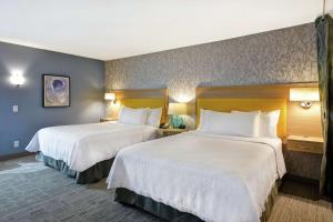 Home2 Suites By Hilton Warner Robins客房内的一张或多张床位