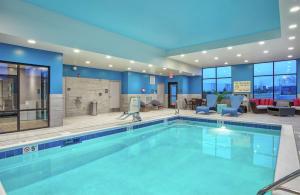 a large swimming pool in a hotel room at Hampton Inn Simpsonville in Simpsonville