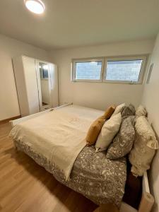 Postel nebo postele na pokoji v ubytování Confortable appart. en résidence (rez-de-chaussé) + 2 fotografie