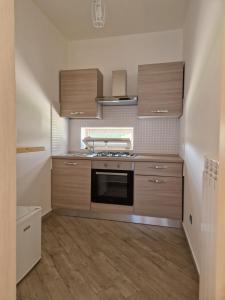 A kitchen or kitchenette at Corte D'Aniello