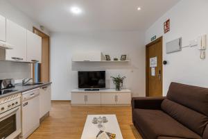 Kuchnia lub aneks kuchenny w obiekcie Waou Apartamentos en Sol Confort 3