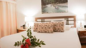 Postel nebo postele na pokoji v ubytování Hotel Zima + 37 fotografií