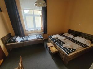Letto o letti in una camera di Hotel Max Šimek