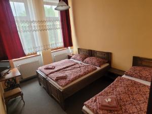 Letto o letti in una camera di Hotel Max Šimek