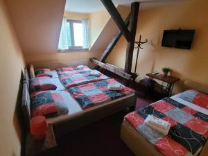 Letto o letti in una camera di Hotel Max Šimek