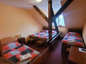 Letto o letti in una camera di Hotel Max Šimek