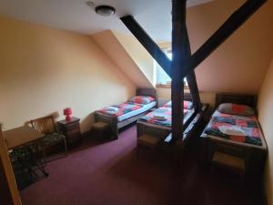 Letto o letti in una camera di Hotel Max Šimek