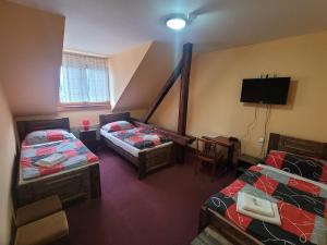 Letto o letti in una camera di Hotel Max Šimek