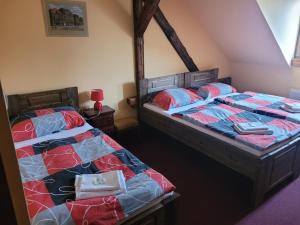 Letto o letti in una camera di Hotel Max Šimek