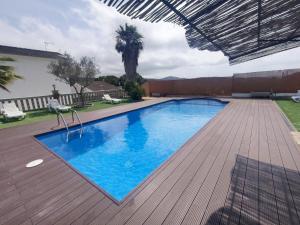 The swimming pool at or close to Bright Villa in Vidreres with Private Pool and Jacuzzi