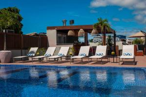 A piscina localizada em Pousada Bahia Tambor ou nos arredores