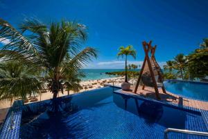 A piscina localizada em Pousada Bahia Tambor ou nos arredores