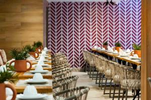 Um restaurante ou outro lugar para comer em Pousada Bahia Tambor