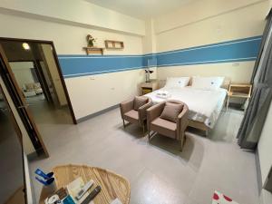 Katil atau katil-katil dalam bilik di Dongjin Bay B&B