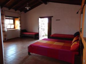 Lova arba lovos apgyvendinimo įstaigoje Casa Rural SoleaRio