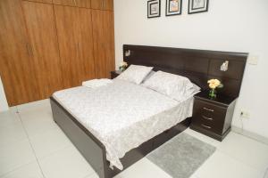 Postel nebo postele na pokoji v ubytování Downtown Apartments "Altos del Sur"