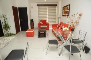 Posezení v ubytování Downtown Apartments "Altos del Sur"