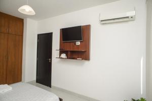 TV a/nebo společenská místnost v ubytování Downtown Apartments "Altos del Sur"