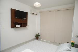TV a/nebo společenská místnost v ubytování Downtown Apartments "Altos del Sur"