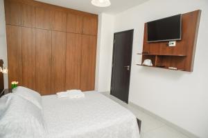 Postel nebo postele na pokoji v ubytování Downtown Apartments "Altos del Sur"