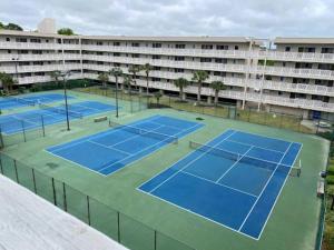 an aerial view of two tennis courts in a hotel at Seaside Sanctuary Condo Villa - Private Beach Access, 3 Pools in Hilton Head Island