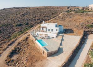 an aerial view of a house in the desert at Traditional villa in Sifnos