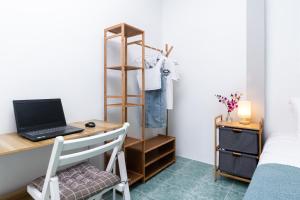 Postel nebo postele na pokoji v ubytování Garden Home 2 + 15 fotografií