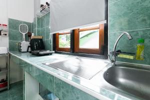 Kuchyň nebo kuchyňský kout v ubytování Garden Home 2