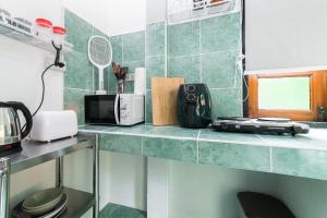 Kuchyň nebo kuchyňský kout v ubytování Garden Home 2