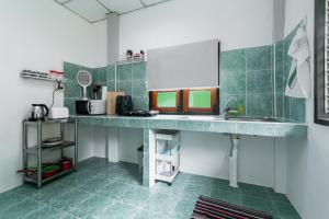 Kuchyň nebo kuchyňský kout v ubytování Garden Home 2