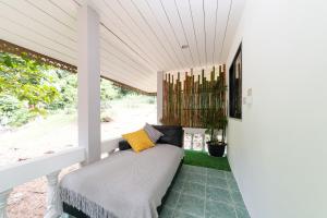 Postel nebo postele na pokoji v ubytování Garden Home 2
