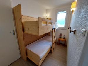 Krevet ili kreveti na kat u jedinici u objektu Appartement Méaudre, 2 pièces, 5 personnes - FR-1-737-26