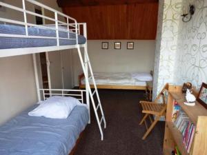 Двухъярусная кровать или двухъярусные кровати в номере Appartement Méaudre, 3 pièces, 6 personnes - FR-1-737-27
