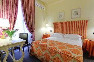 Katil atau katil-katil dalam bilik di Relais Lavagnini Florence
