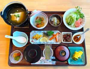 a tray with various food items on a table at Motobu Green Park and Golf Course in Motobu