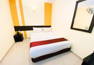 Sun Inns D'mind 3 Seri Kembangan客房内的一张或多张床位
