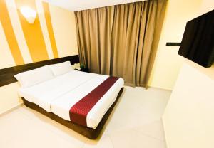 Sun Inns D'mind 3 Seri Kembangan客房内的一张或多张床位