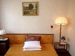 Łóżko lub łóżka w pokoju w obiekcie Karet Obiekt Hotelowy