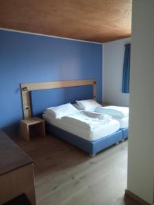 Postel nebo postele na pokoji v ubytování Agritur I Colori