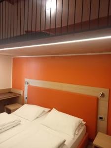 Postel nebo postele na pokoji v ubytování Agritur I Colori