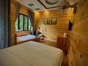 Voodi või voodid majutusasutuse Little Home Homestay toas +37 fotot