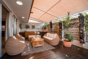 Posezení v ubytování Hôtel Le Lagon